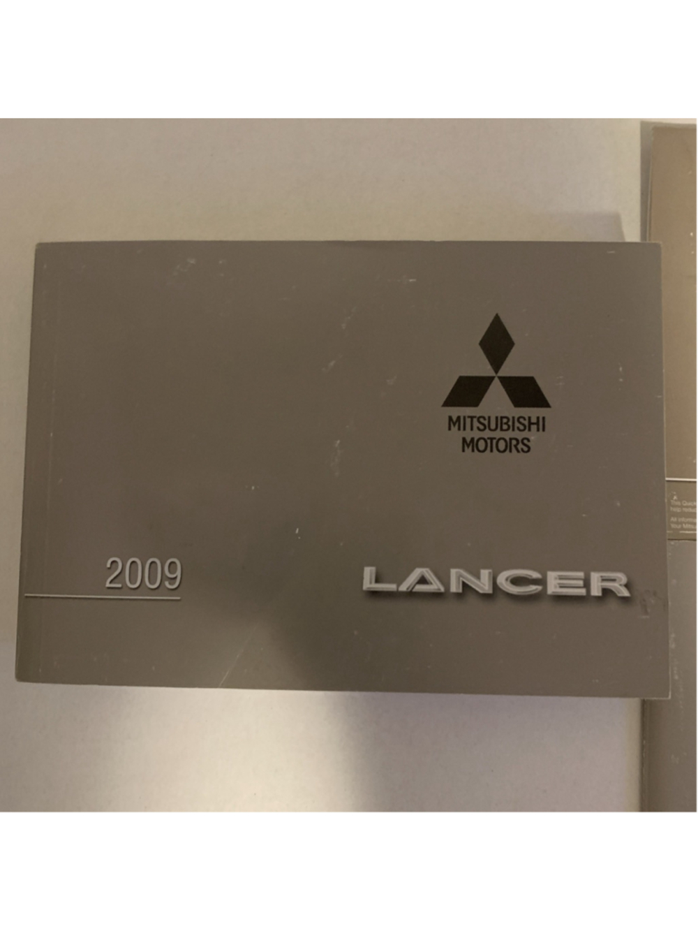 2009 Mitsubishi Lancer (Sedan / 2.0L / AT) Owners Manual - Hardly Used - Picture 2 of 12